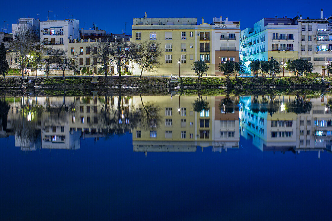 Night Reflections of El Paseo de La O, Triana, Sevilla, on Guadalquivir River