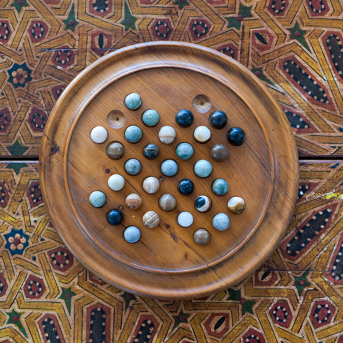 Fes, Morocco. Wooden game of marbles.