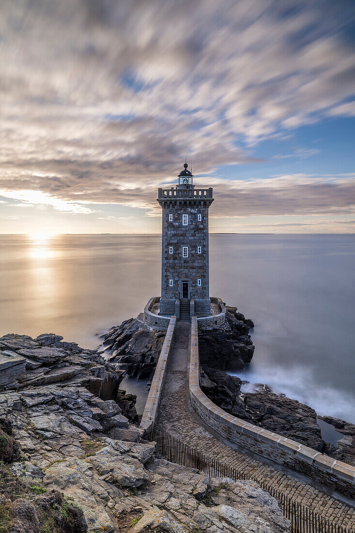 France, Brittany, Le Conquet. Sun setting at the Kermorvan Lighthouse