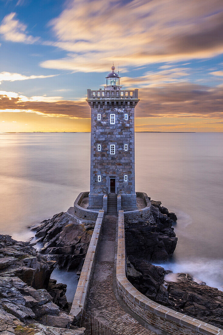 France, Brittany, Le Conquet. Sun setting at the Kermorvan Lighthouse