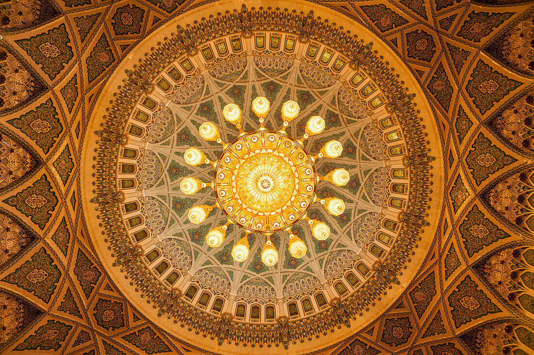 The ceiling of the men's prayer room in the Sultan Qaboos Grand Mosque, Muscat, Oman.