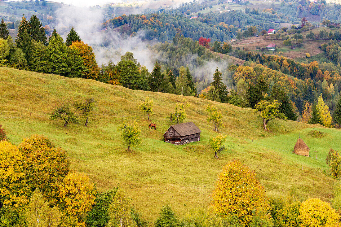 Romania, Transylvania. Colorful, white mountain landscape.