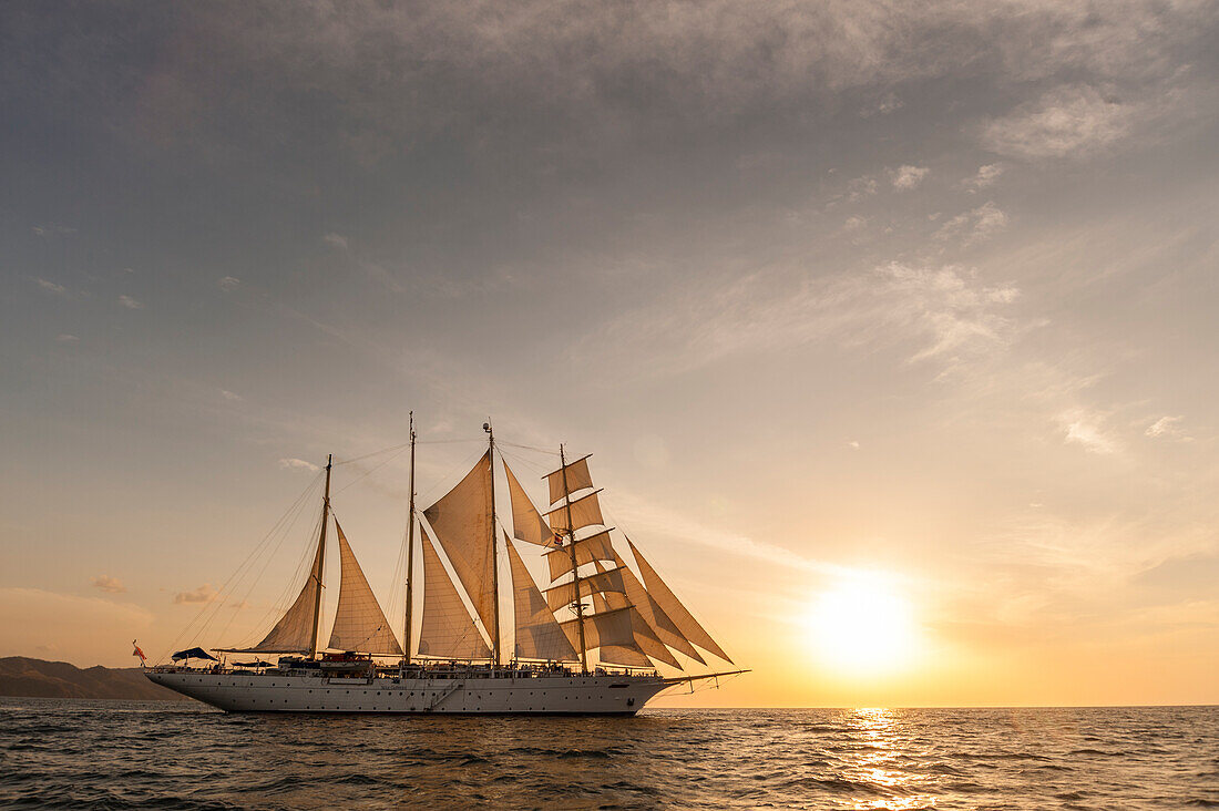 The Star Flyer sailing cruise ship underway at sunset. Costa Rica. (Editorial Use Only)