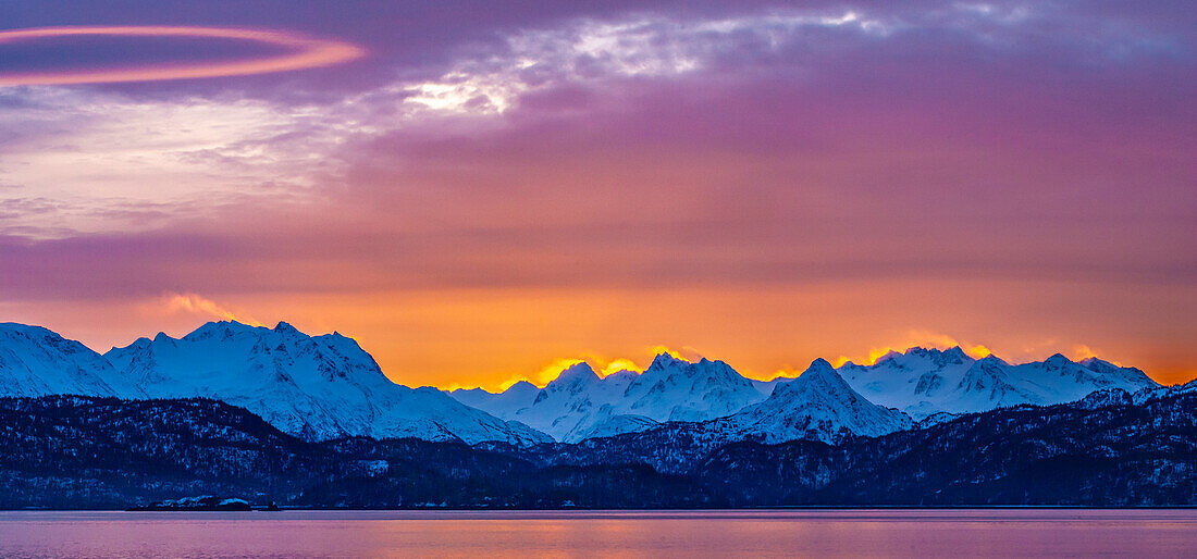 USA, Alaska. Sunrise panoramic on mountains and Chilkat River.