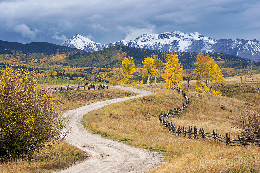 USA, Colorado, Uncompahgre National Forest. Landscape with county road and San Juan Mountains.