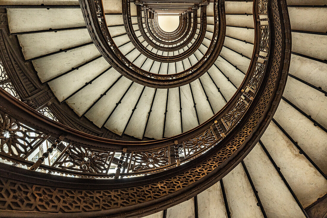 USA, Illinois, Chicago. Spiral staircase in Rookery Building designed by Frank Lloyd Wright. (Editorial Use Only)