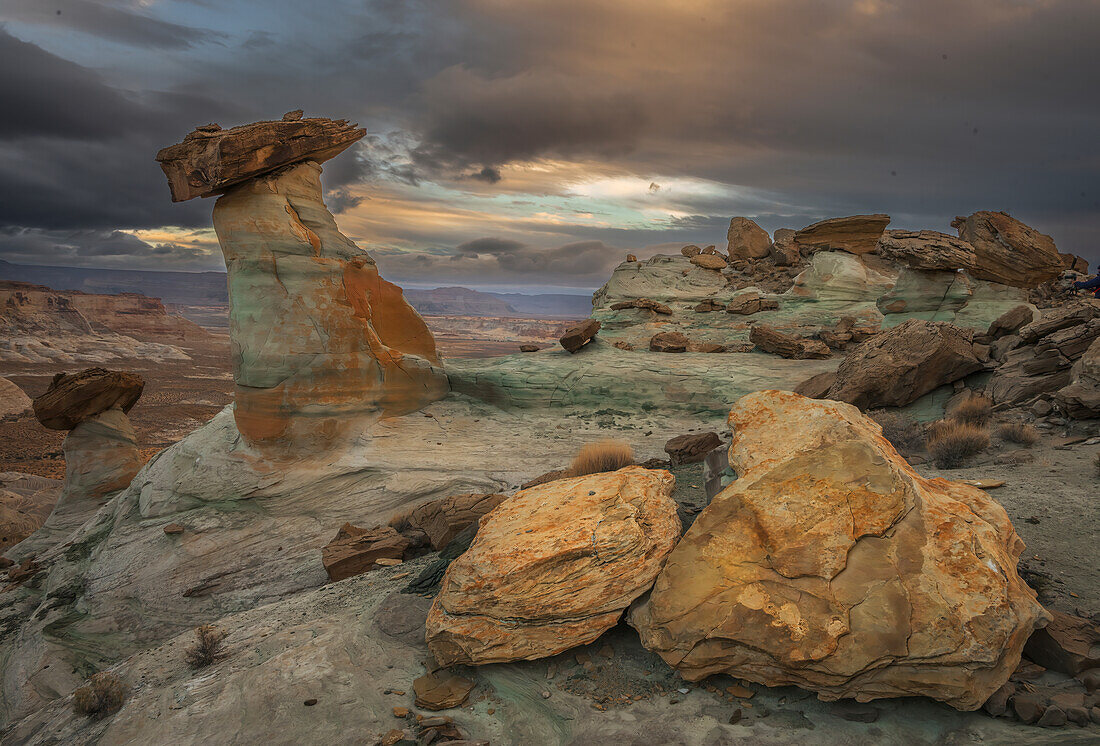 USA, Utah, Capital Reef National Park. Cloudy sunrise on rock formations.