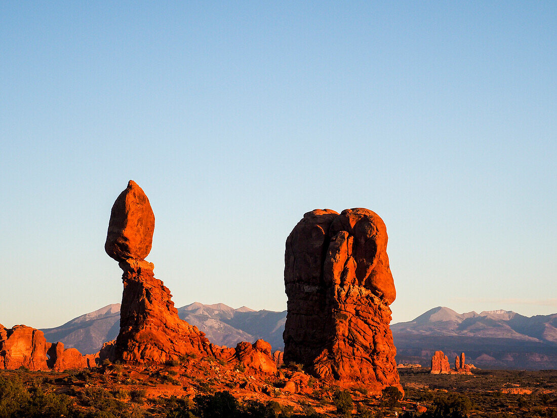 USA, Utah, Arches National Park. Balance Rock at sunset