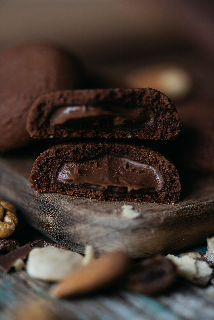 Close-up view of a chocolate cookie with cocoa cream