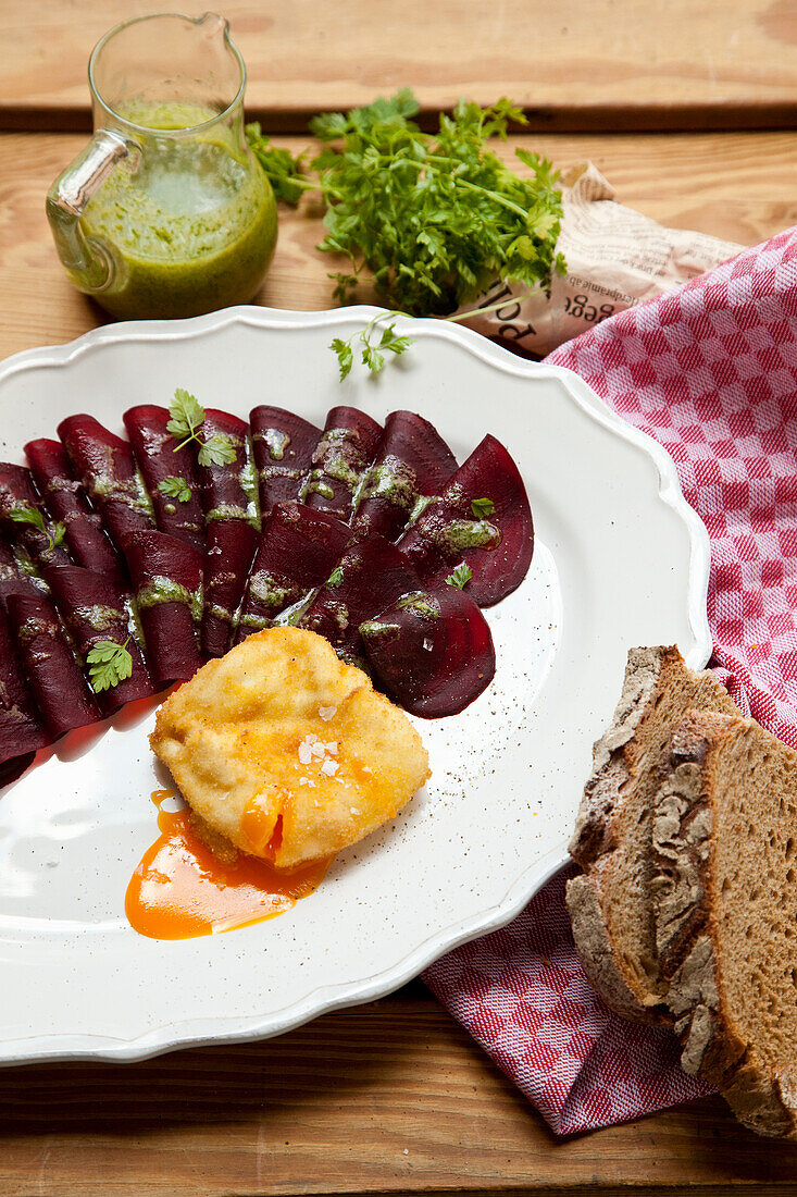 Beetroot carpaccio with poached egg