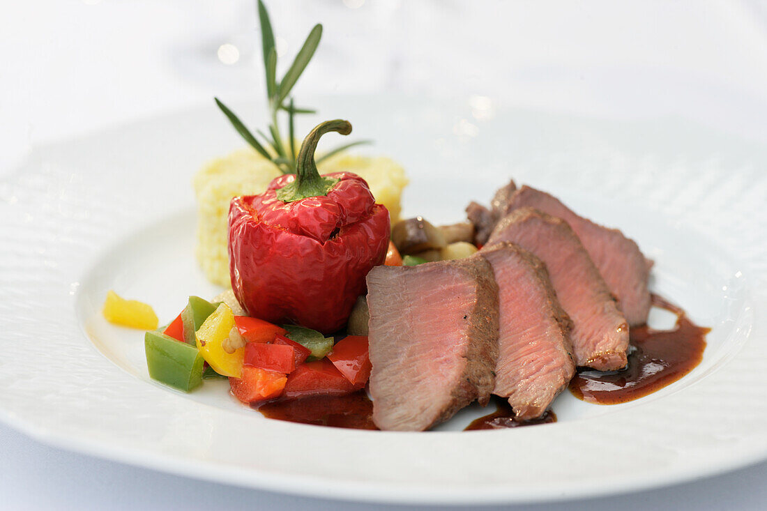 Saddle of lamb with vegetables and polenta