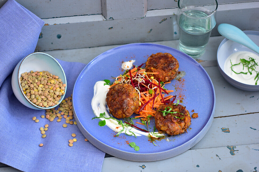 Lentil meatballs with carrot and beetroot crudités and sour cream