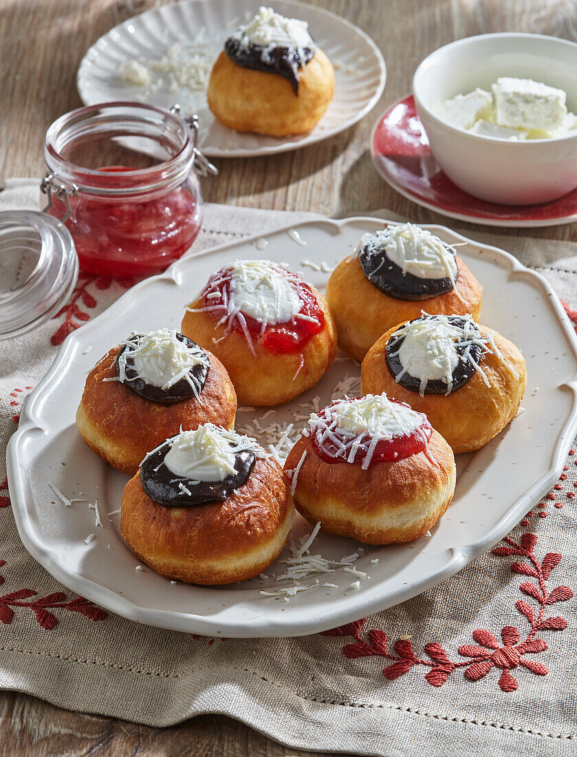 Doughnuts with plum jam, marmalade and quark cream