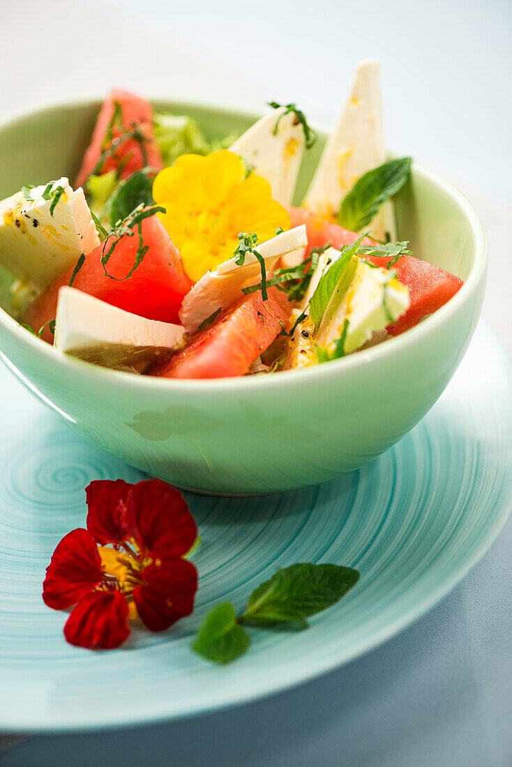 Melon and feta salad with lemon, mint and honey