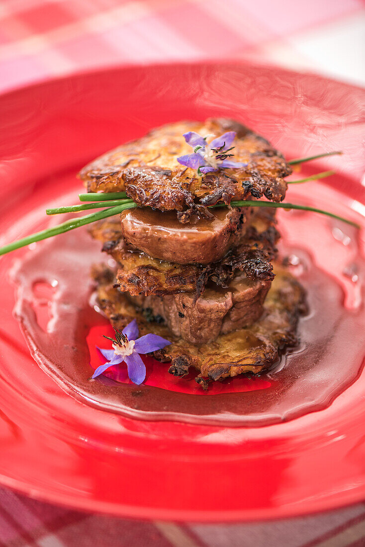 Pork fillet in malt sauce on sauerkraut rösti