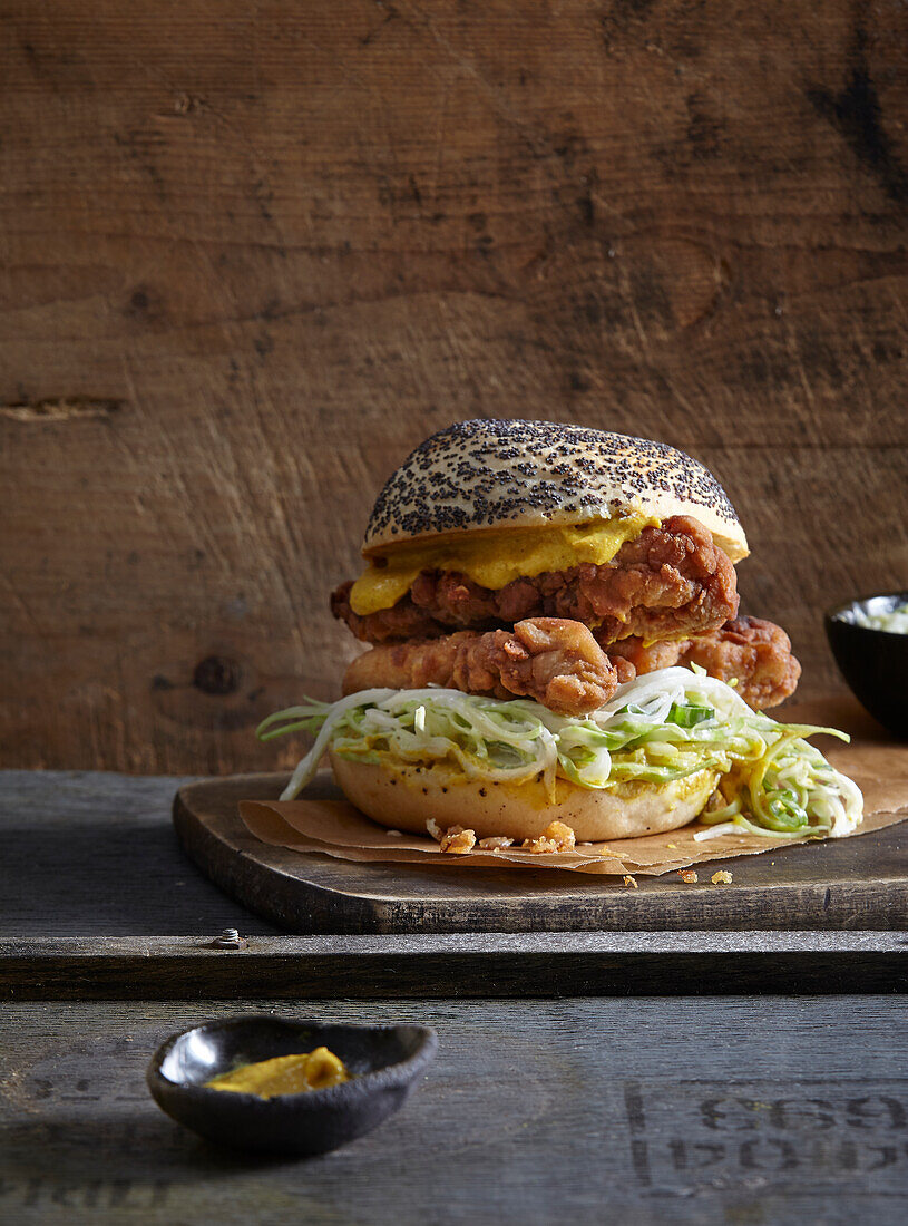 Chicken burger with coleslaw and curry sauce