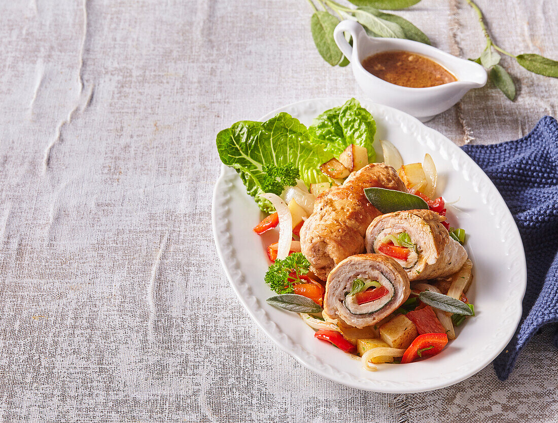 Stuffed pork roulades with vegetables