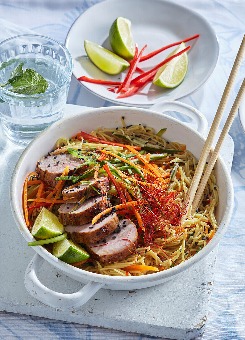 Thai noodle salad with pork fillet and vegetables