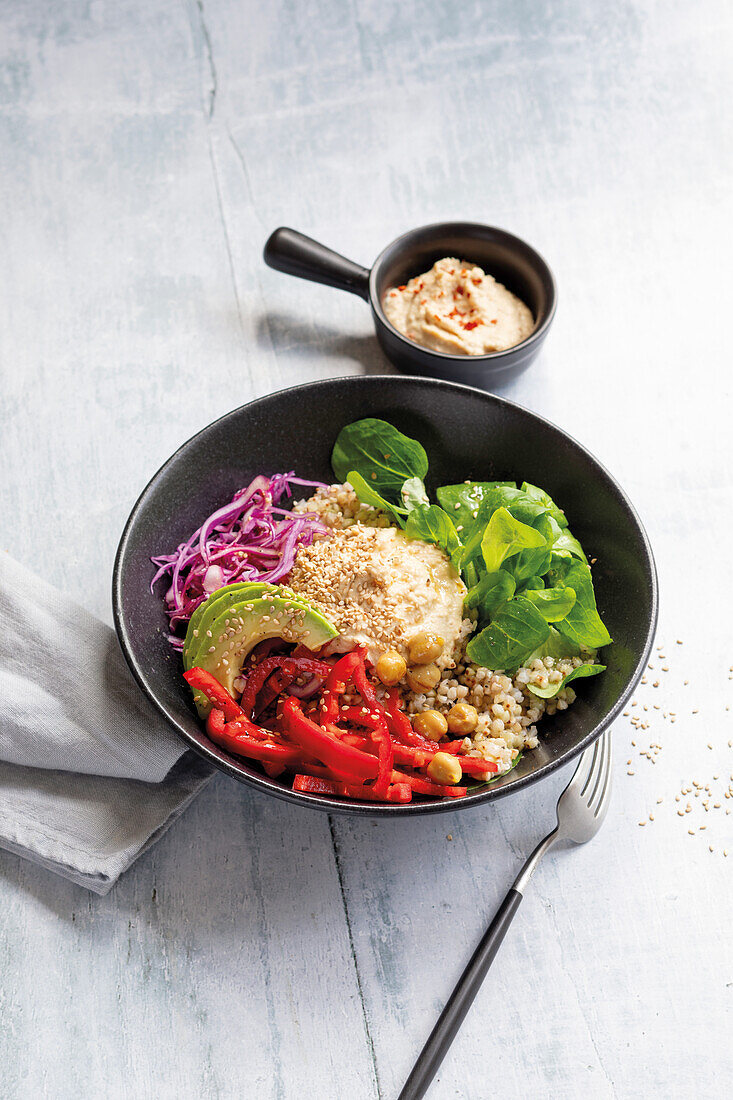 Buckwheat bowl with vegetables and hummus