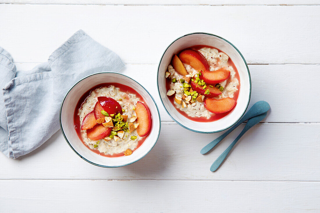Almond porridge with plums and nuts