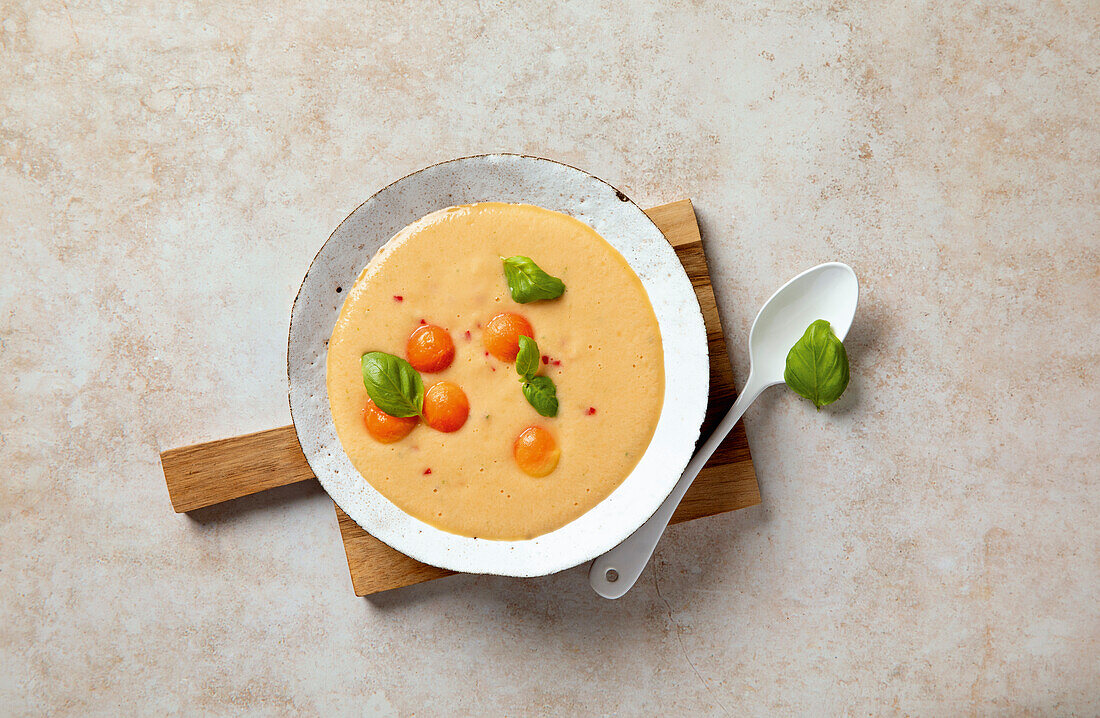 Papaya and cucumber cold dish with basil