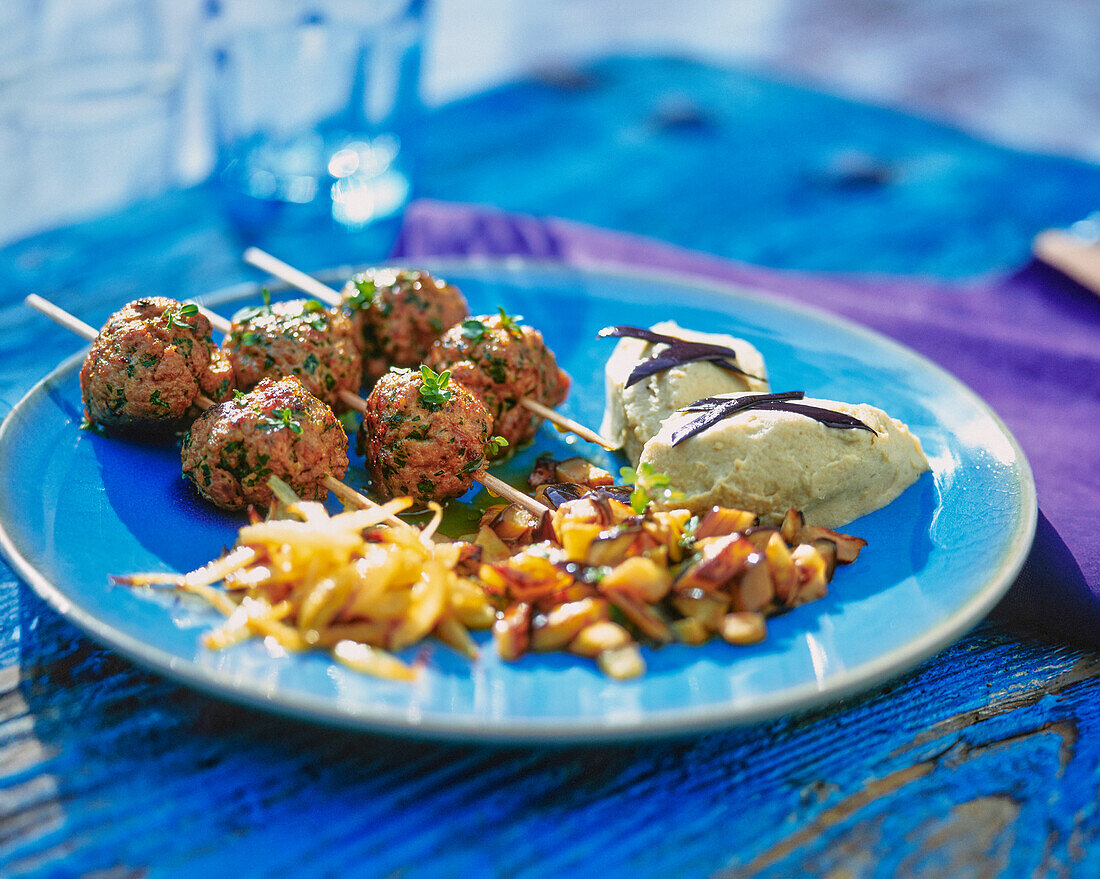 Lamb meatballs with aubergine puree and roast potatoes