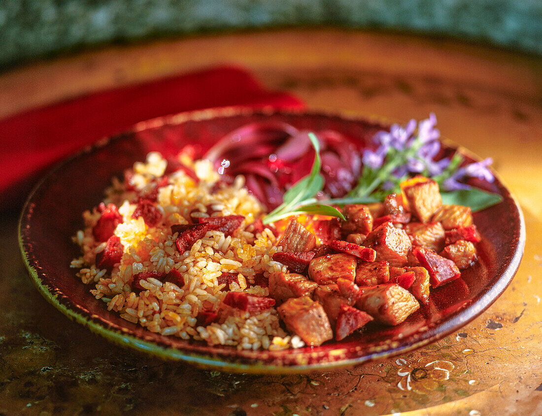 Sautéed pork with red onions and rice