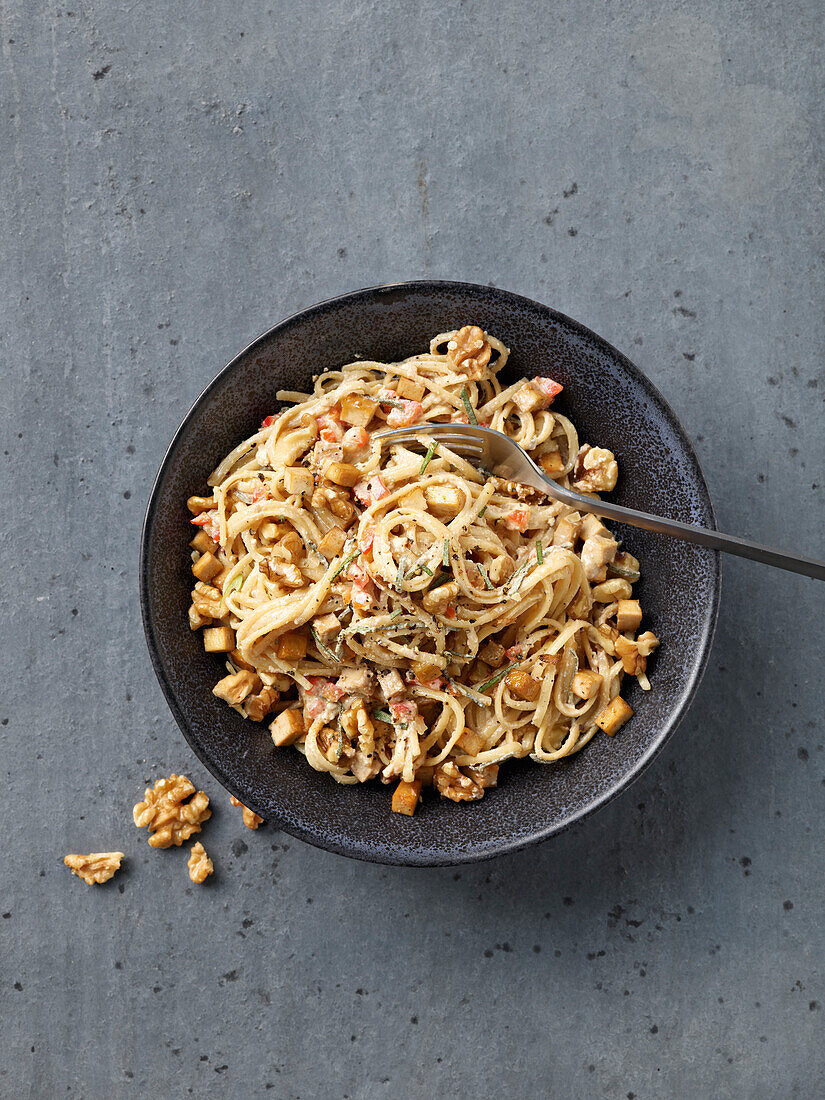 Spaghetti with tofu, walnuts and sherry sauce