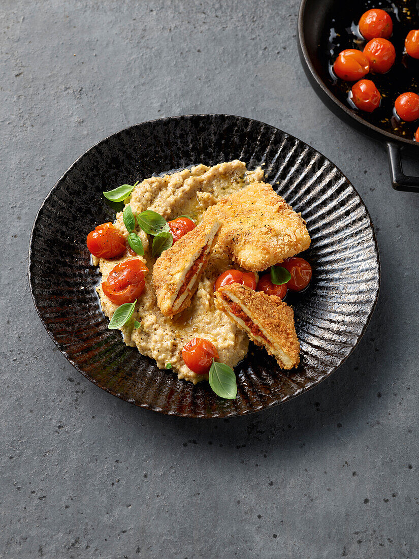 Tofu piccata with polenta and cherry tomatoes