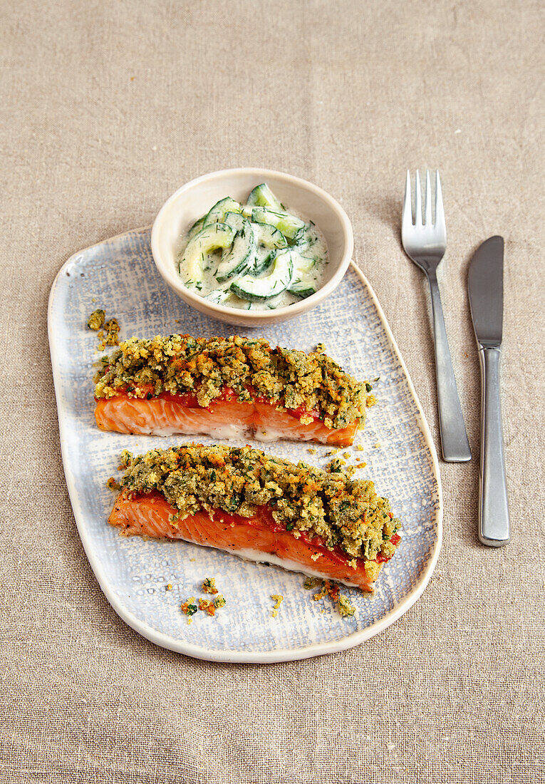 Salmon fillet with herb crust and cucumber salad