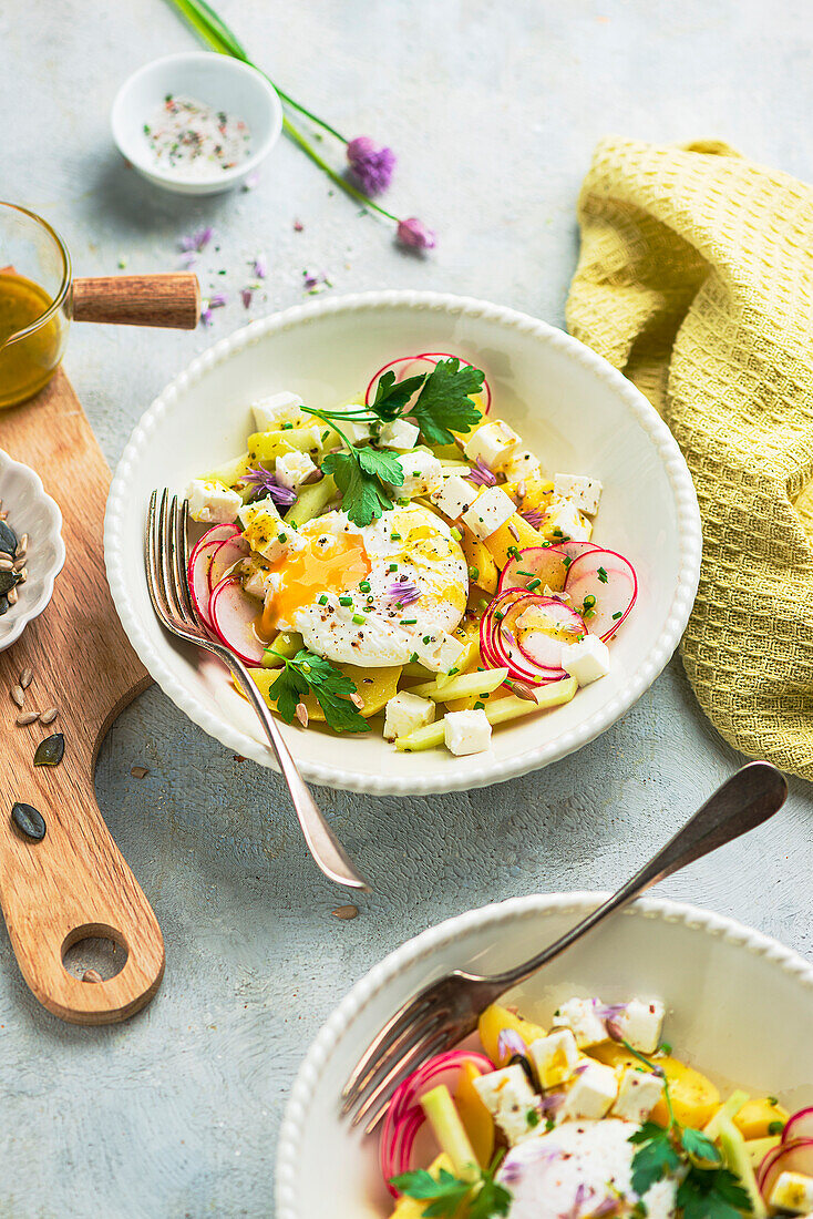 Potato salad with kohlrabi, radish and egg