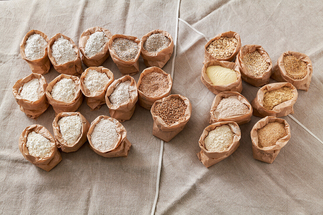 Different types of flour in paper bags