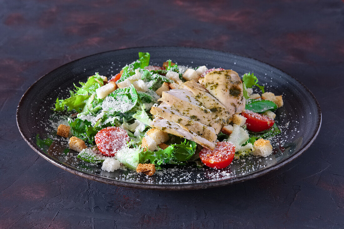 Caesar salad with grilled chicken breast