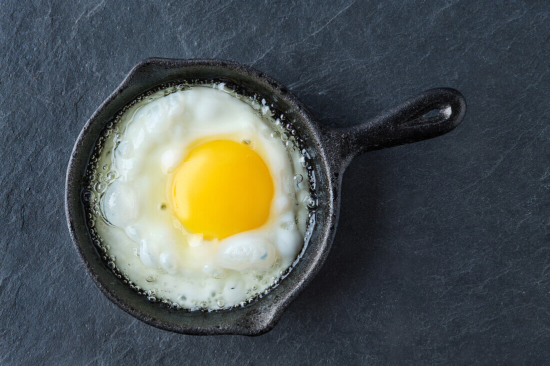 Fried egg in a small cast iron pan