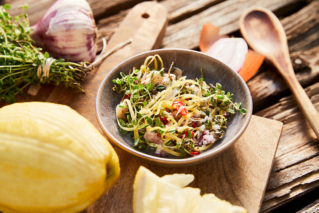 Fresh salad with herbs, lemons and garlic