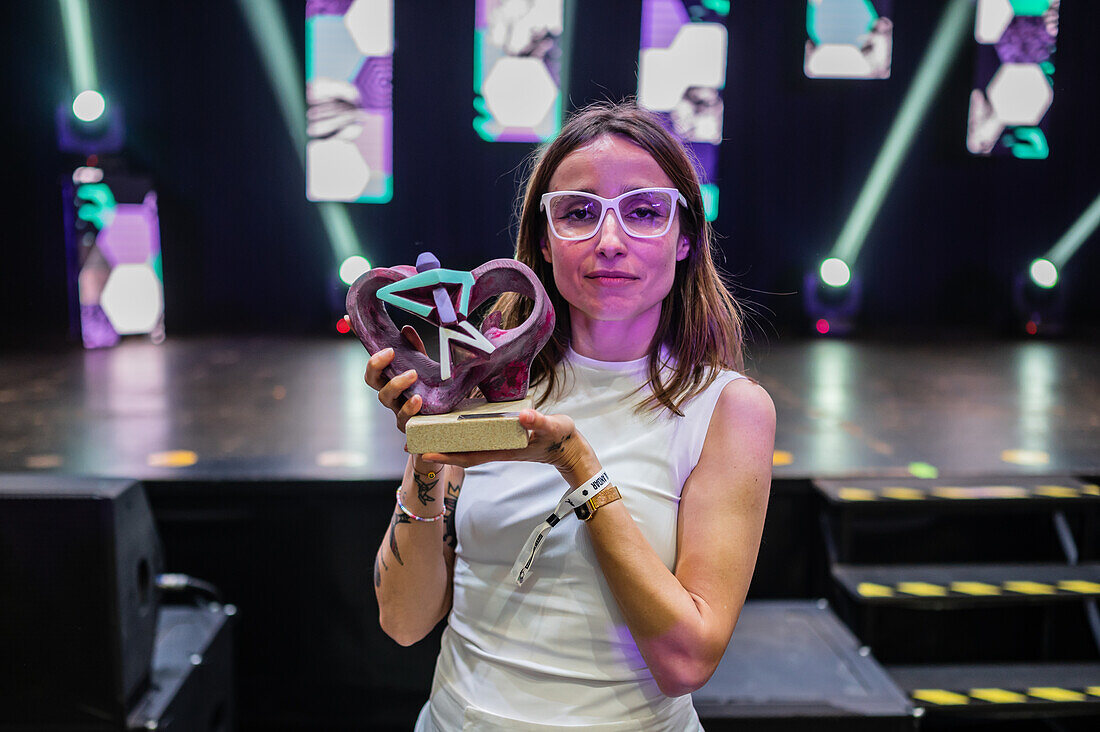 Portrait of Zahara, winner of the award for best Artist, holding her award at the MIN Independent Music Awards 2024, Zaragoza, Spain