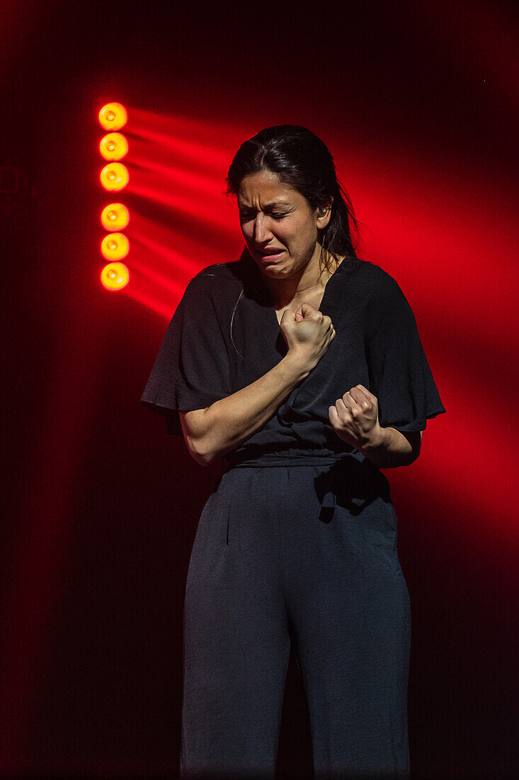 The sign interpreter acting during a live song at the MIN Independent Music Awards 2024, Zaragoza, Spain