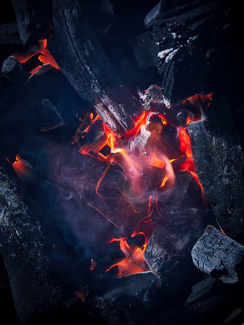 Glowing charcoal and flames