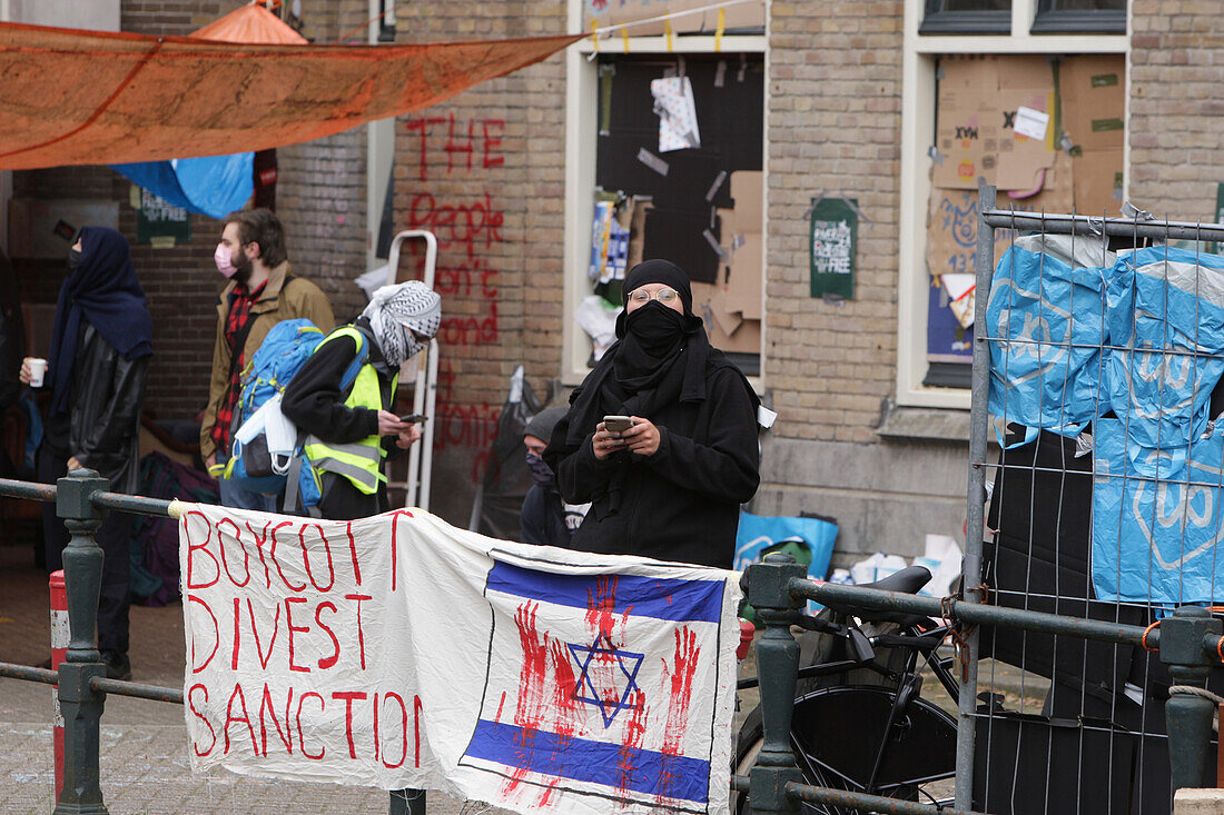 Pro-Palestinian students up a barricade protest against the ongoing conflict Israel and the Palestinian on the campus University of Amsterdam on May 8, 2023 in Amsterdam,Netherlands.