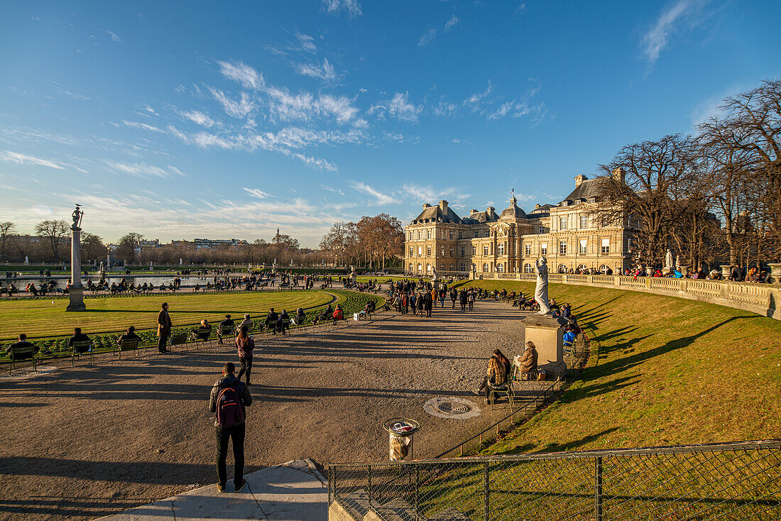 Visitors enjoy a sunny winter afternoon at the Luxembourg Palace and Gardens.