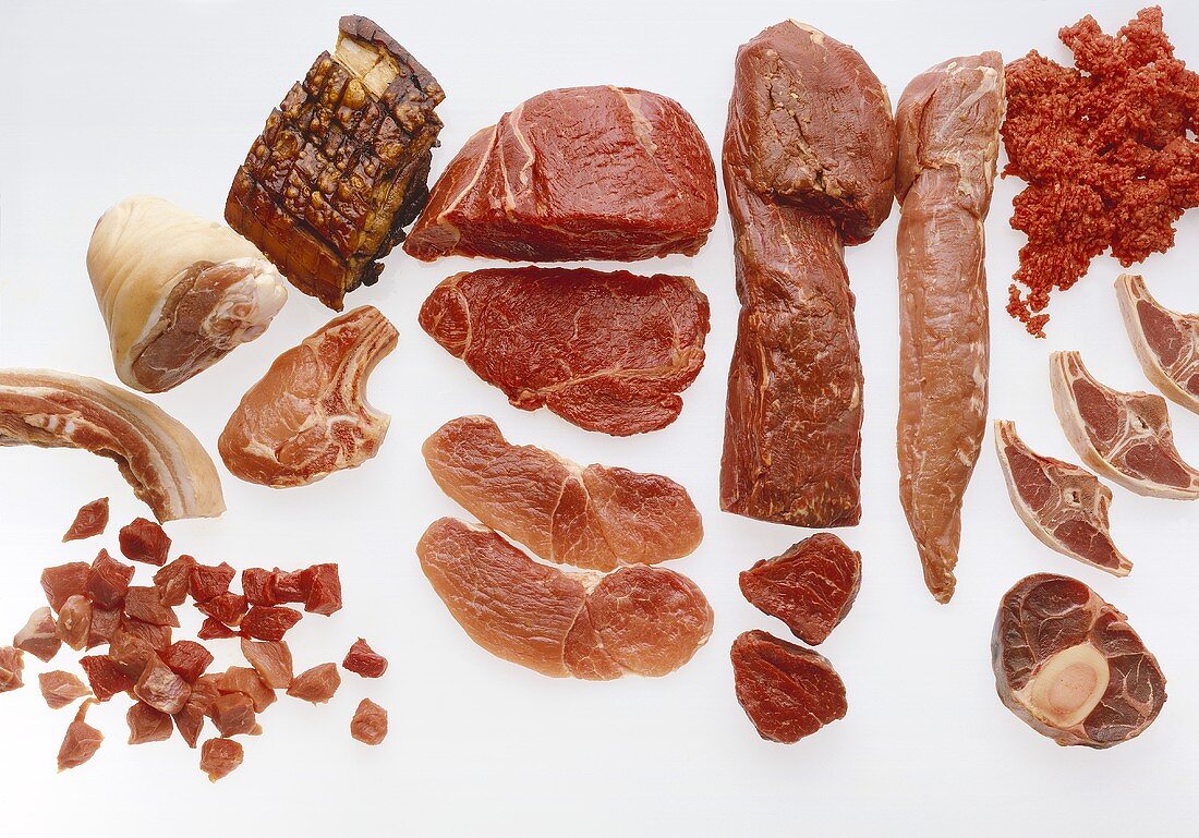 Various types of meat on white background