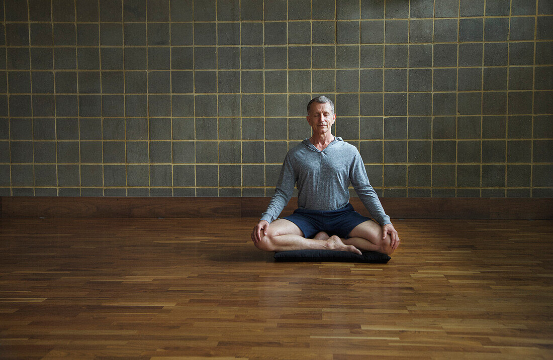 Mature Man Practicing Yoga, Easy pose