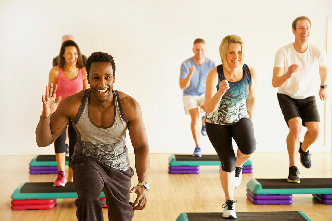 Group of People at Step Aerobics Class