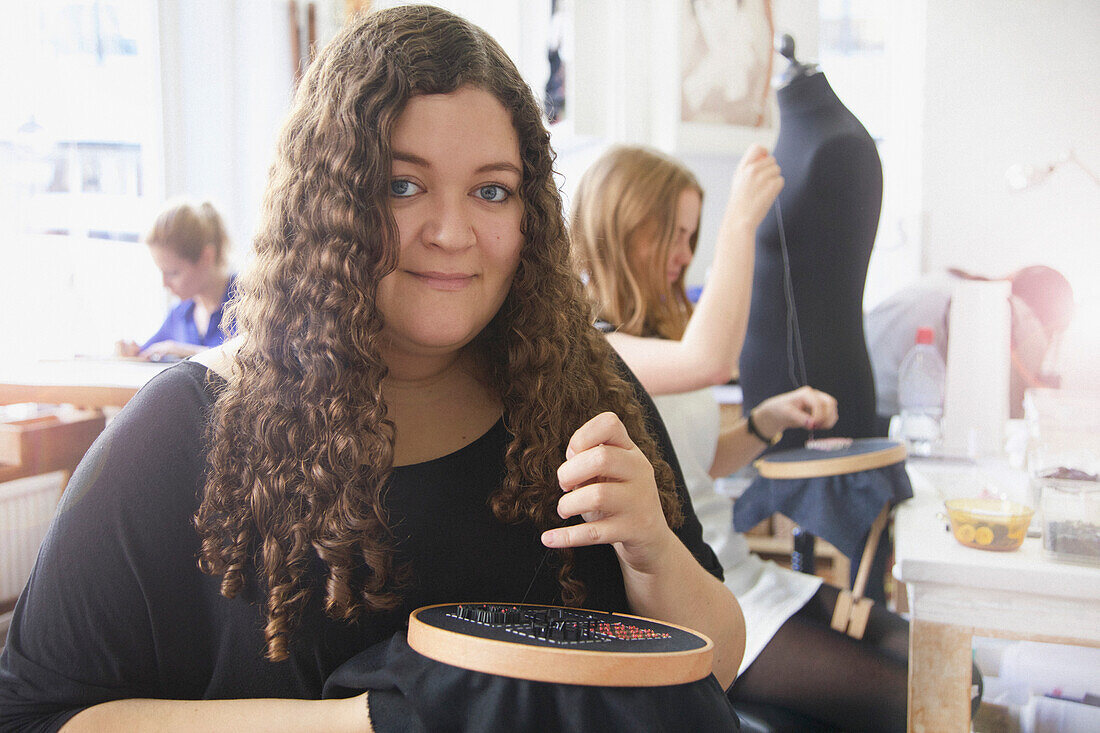 Portrait of Female Employee at Embroidery Design Studio