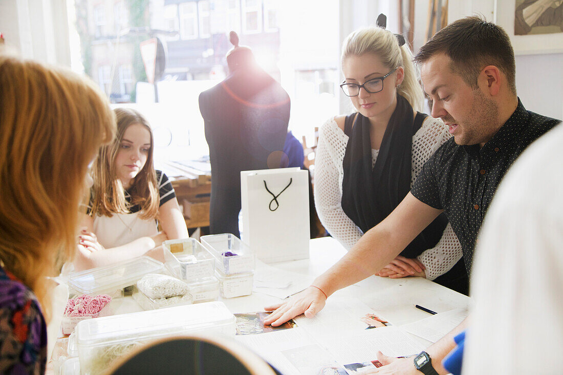 Design Professionals Working at Embroidery Studio