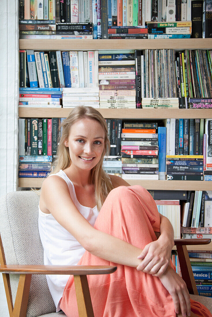 Woman Sitting on Armchair