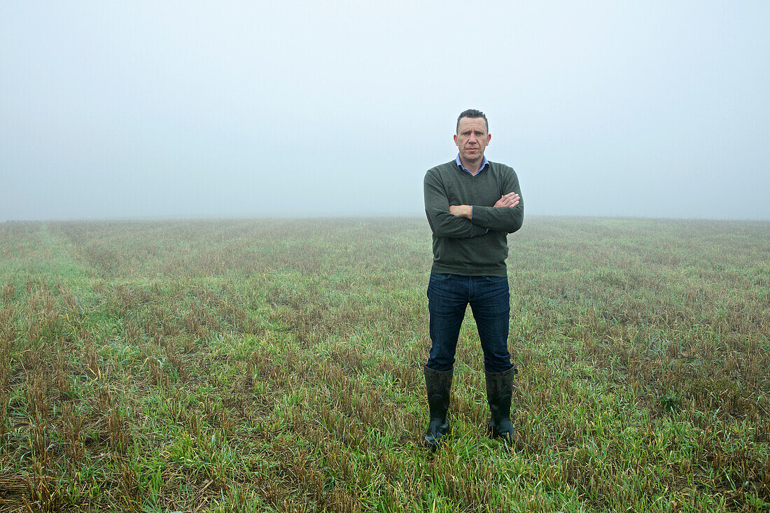 Man Standing in Field