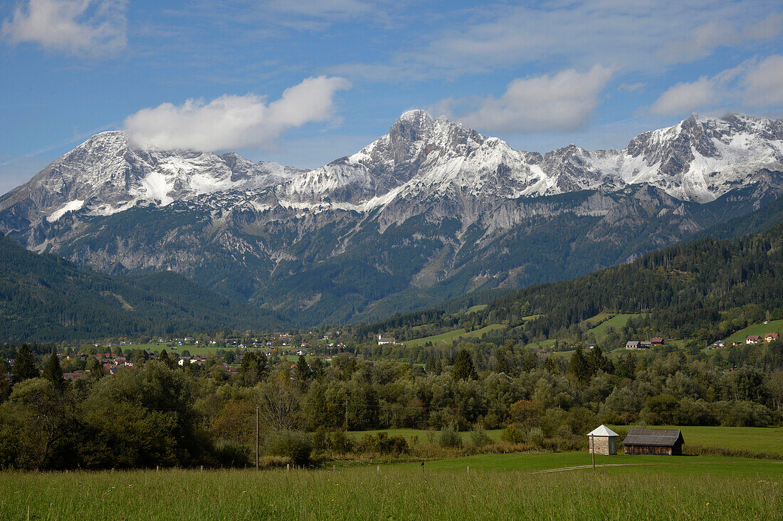 Austria,Styria,ENNSTAL Alps, high snowy mountains overloooked the fields and forests of the admont valley