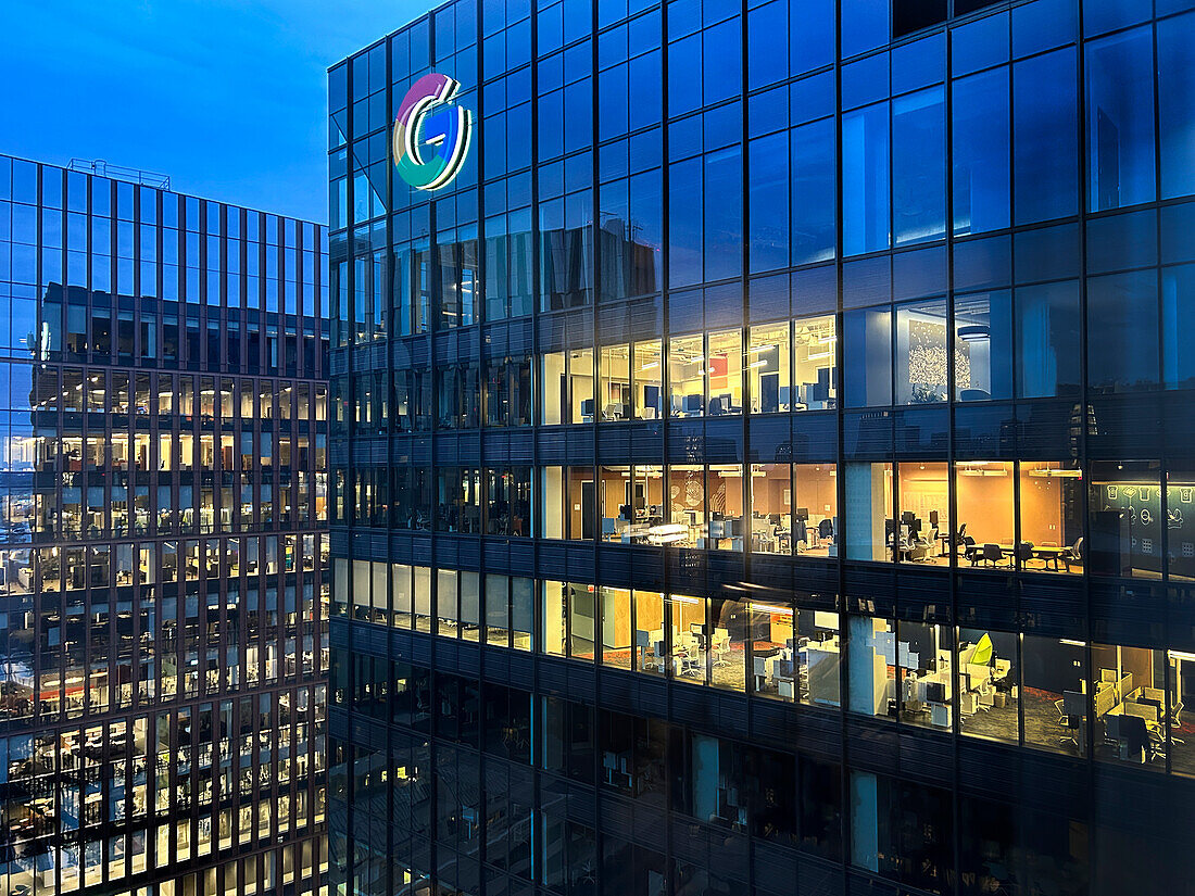 Google corporate office building, exterior view illuminated at dusk, Cambridge, Massachusetts, USA