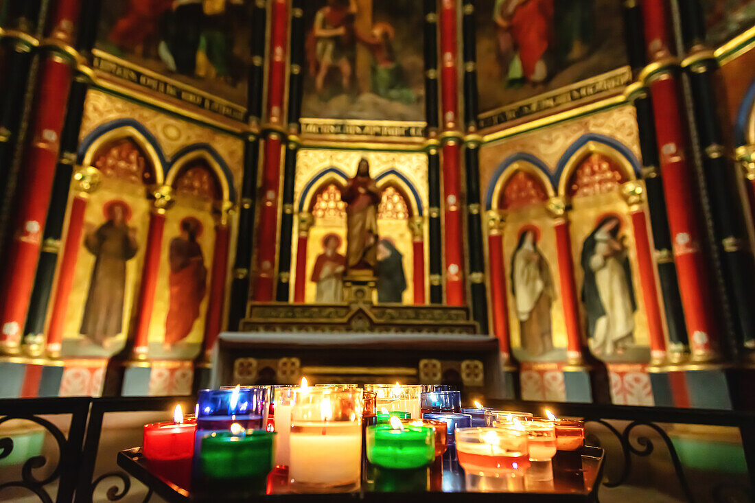 Christmas candles burning at interior of Bayonne cathedral (Sainte-Marie cathedral)